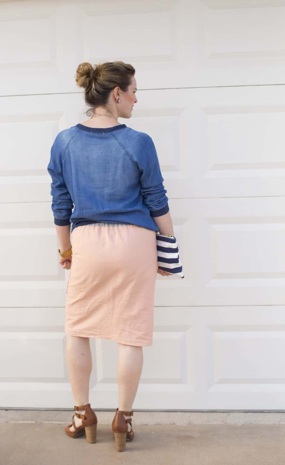 This skirt sewing tutorial is quick, easy and beginner friendly! Learn how to make  DIY flat-front skirt in just a couple of hours and with just a yard of fabric!