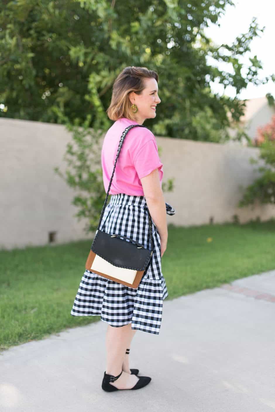 Gingham is still going strong as a trend in women's clothing and we're loving it! But it's not always easy to figure out what to wear with it. Read on for tips on how to style a gingham skirt and ensure you keep it looking grown up!